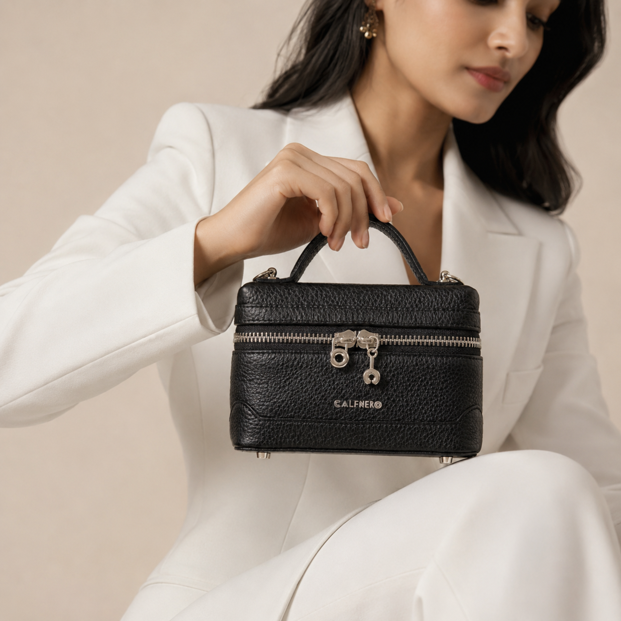 The Tiny Drip Sling Bag