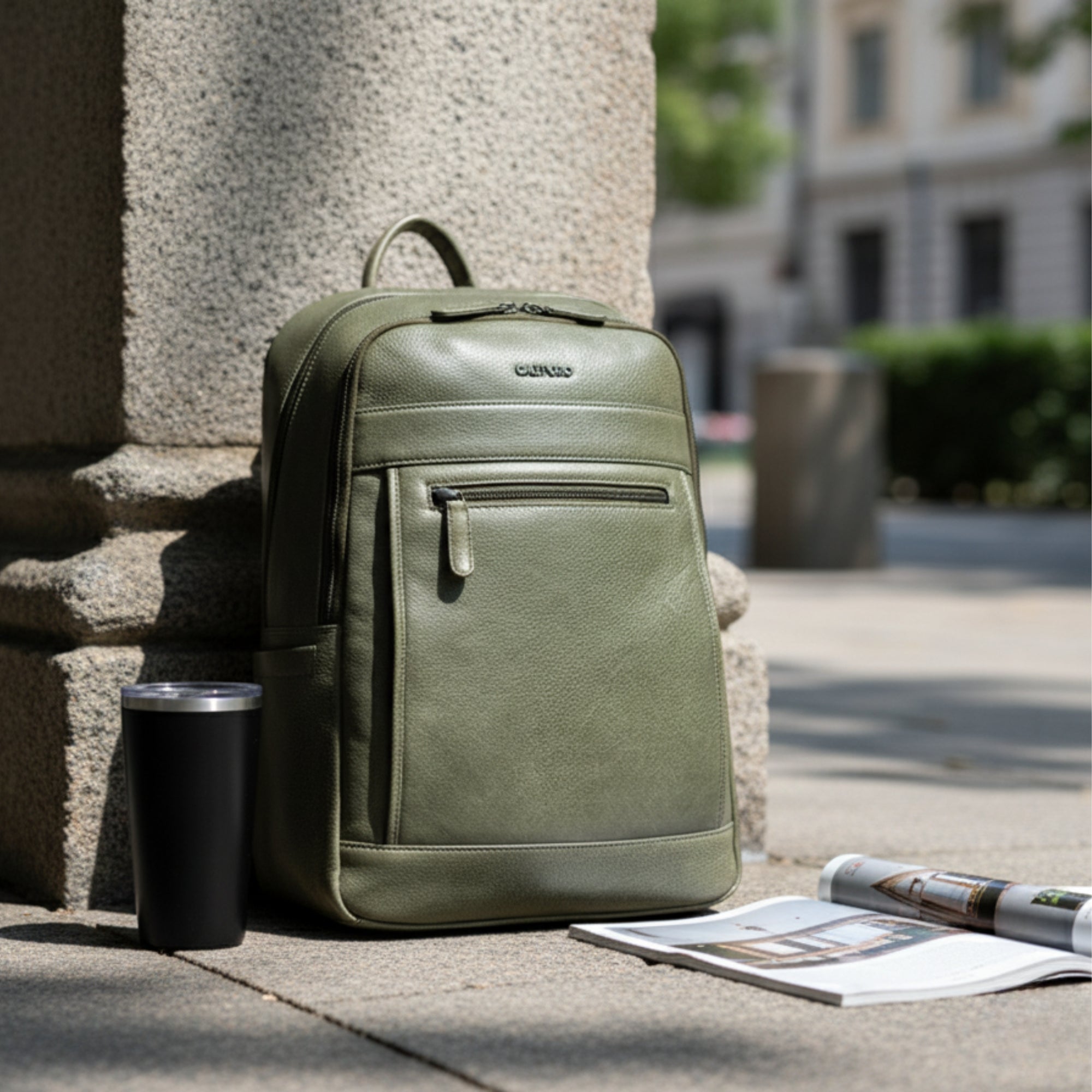 "Sage" olive green leather backpack